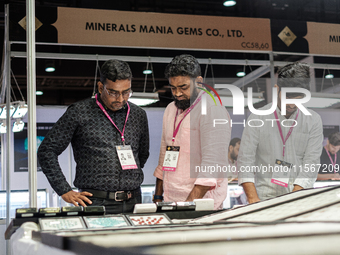 Visitors and exhibitors attend the 70th gems and jewelry fair in Bangkok, Thailand. The trade show is one of the most important events of it...