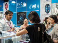 Visitors and exhibitors attend the 70th gems and jewelry fair in Bangkok, Thailand. The trade show is one of the most important events of it...