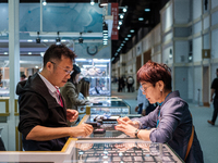 Visitors and exhibitors attend the 70th gems and jewelry fair in Bangkok, Thailand. The trade show is one of the most important events of it...