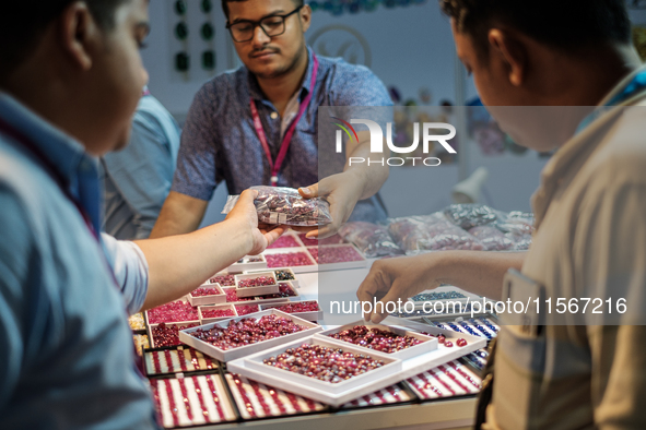 Visitors and exhibitors attend the 70th gems and jewelry fair in Bangkok, Thailand. The trade show is one of the most important events of it...