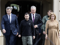 Croatia's Prime Minister Andrej Plenkovic, Ukrainian President Volodymyr Zelenskiy, Lithuania's President Gitanas Nauseda, and Latvia's Prim...