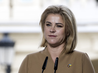 Latvia's Prime Minister Evika Silina attends a joint press conference with Lithuania's President Nauseda, Ukrainian President Zelenskiy, and...