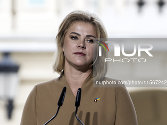 Latvia's Prime Minister Evika Silina attends a joint press conference with Lithuania's President Nauseda, Ukrainian President Zelenskiy, and...