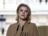 Latvia's Prime Minister Evika Silina attends a joint press conference with Lithuania's President Nauseda, Ukrainian President Zelenskiy, and...