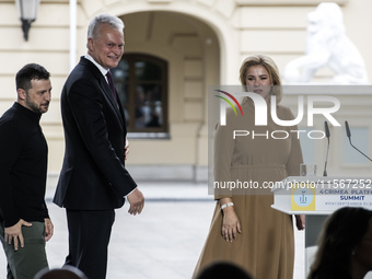 Ukrainian President Volodymyr Zelenskiy, Latvia's Prime Minister Evika Silina, and Croatia's Prime Minister Andrej Plenkovic after a joint p...