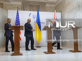 US Secretary of State Antony Blinken, Minister of Foreign Affairs of Ukraine Andrii Sybiha, and UK Foreign Secretary David Lammy (L to R) ho...