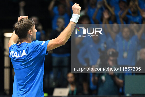 Matteo Arnaldi (ITA) is in action during the 2024 Davis Cup Finals Group Stage Bologna match between Italy and Brazil at Unipol Arena in Bol...