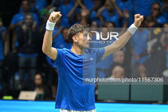 Matteo Arnaldi (ITA) is in action during the 2024 Davis Cup Finals Group Stage Bologna match between Italy and Brazil at Unipol Arena in Bol...