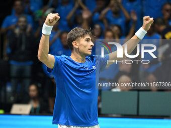 Matteo Arnaldi (ITA) is in action during the 2024 Davis Cup Finals Group Stage Bologna match between Italy and Brazil at Unipol Arena in Bol...