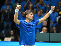 Matteo Arnaldi (ITA) is in action during the 2024 Davis Cup Finals Group Stage Bologna match between Italy and Brazil at Unipol Arena in Bol...