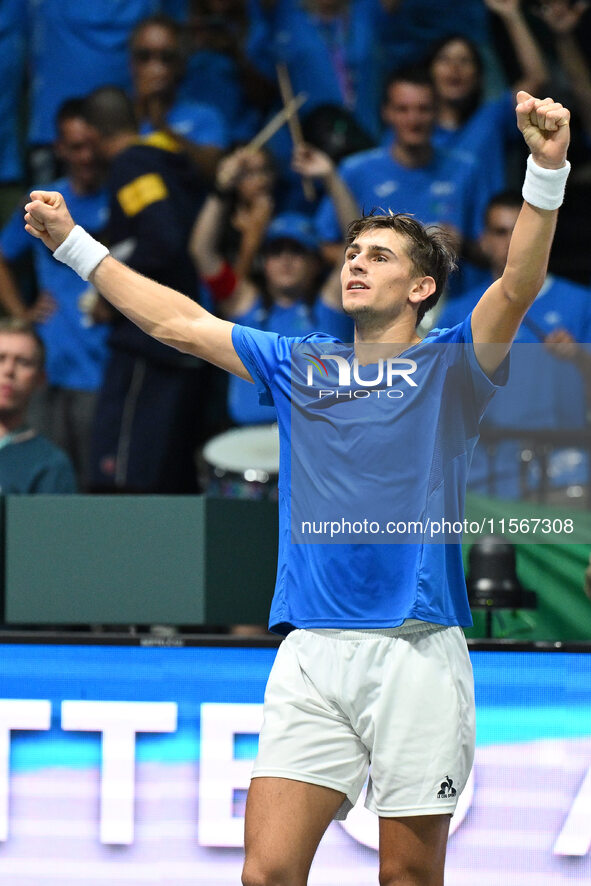 Matteo Arnaldi (ITA) is in action during the 2024 Davis Cup Finals Group Stage Bologna match between Italy and Brazil at Unipol Arena in Bol...