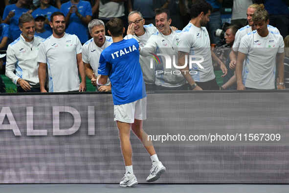 Matteo Arnaldi (ITA) is in action during the 2024 Davis Cup Finals Group Stage Bologna match between Italy and Brazil at Unipol Arena in Bol...