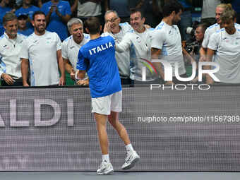 Matteo Arnaldi (ITA) is in action during the 2024 Davis Cup Finals Group Stage Bologna match between Italy and Brazil at Unipol Arena in Bol...