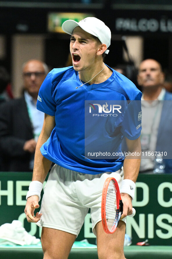 Matteo Arnaldi (ITA) is in action during the 2024 Davis Cup Finals Group Stage Bologna match between Italy and Brazil at Unipol Arena in Bol...