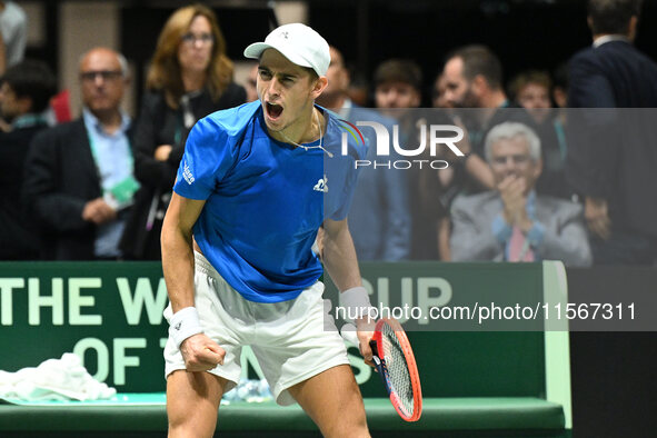 Matteo Arnaldi (ITA) is in action during the 2024 Davis Cup Finals Group Stage Bologna match between Italy and Brazil at Unipol Arena in Bol...