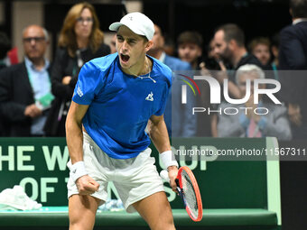 Matteo Arnaldi (ITA) is in action during the 2024 Davis Cup Finals Group Stage Bologna match between Italy and Brazil at Unipol Arena in Bol...