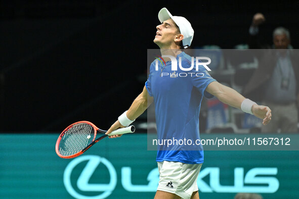 Matteo Arnaldi (ITA) is in action during the 2024 Davis Cup Finals Group Stage Bologna match between Italy and Brazil at Unipol Arena in Bol...