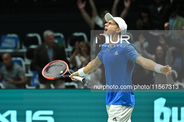 Matteo Arnaldi (ITA) is in action during the 2024 Davis Cup Finals Group Stage Bologna match between Italy and Brazil at Unipol Arena in Bol...