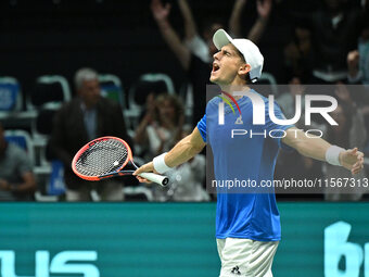 Matteo Arnaldi (ITA) is in action during the 2024 Davis Cup Finals Group Stage Bologna match between Italy and Brazil at Unipol Arena in Bol...