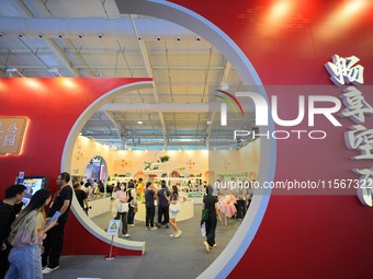 Visitors visit the Cultural and Tourism Services exhibition area at the 2024 China Beijing International Fair for Trade in Services (CIFTIS)...