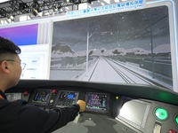 Spectators experience a simulated driver of the Fuxing EMU at the 2024 China Beijing International Fair for Trade in Services (CIFTIS) in Be...