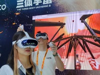 Visitors experience a VR game at the 2024 China Beijing International Fair for Trade in Services (CIFTIS) in Beijing, China, on September 12...