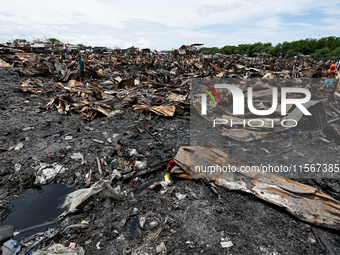 A view of the rubble of damaged houses following a huge fire that engulfs at least 800 houses in Bacoor, Cavite, the Philippines, on Septemb...