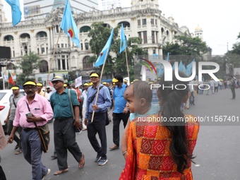 Members of the All Bengal Teachers Association, a teacher's movement in the Indian state of West Bengal, shout slogans during a protest rall...