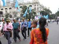 Members of the All Bengal Teachers Association, a teacher's movement in the Indian state of West Bengal, shout slogans during a protest rall...