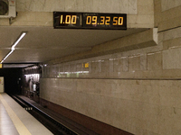 A digital clock is at the Demiivska metro station after the traffic launches following nine months of repairs in the tunnel between Demiivsk...