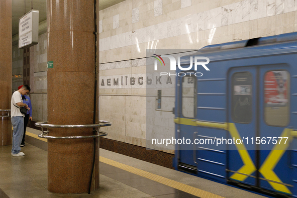 A train arrives at the Demiivska metro station after the traffic launches following nine months of repairs in the tunnel between Demiivska a...