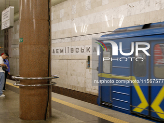 A train arrives at the Demiivska metro station after the traffic launches following nine months of repairs in the tunnel between Demiivska a...