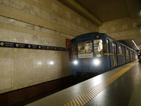 A train arrives at the Demiivska metro station after the traffic launches following nine months of repairs in the tunnel between Demiivska a...