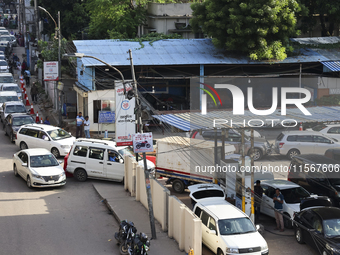 Vehicles queue to get fuel near a gas station during an acute gas shortage in Dhaka, Bangladesh, on September 12, 2024. (