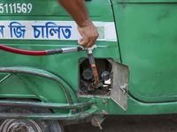 Vehicles queue to get fuel near a gas station during an acute gas shortage in Dhaka, Bangladesh, on September 12, 2024. (