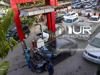 Vehicles queue to get fuel near a gas station during an acute gas shortage in Dhaka, Bangladesh, on September 12, 2024. (