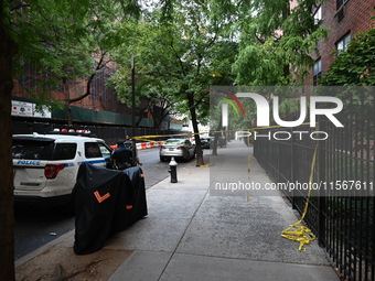 Crime scene tape is at the scene. A man is shot in the back multiple times in Manhattan, New York, United States, on September 12, 2024. At...