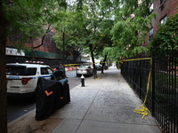 Crime scene tape is at the scene. A man is shot in the back multiple times in Manhattan, New York, United States, on September 12, 2024. At...