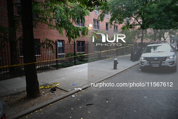 Crime scene tape is at the scene. A man is shot in the back multiple times in Manhattan, New York, United States, on September 12, 2024. At...