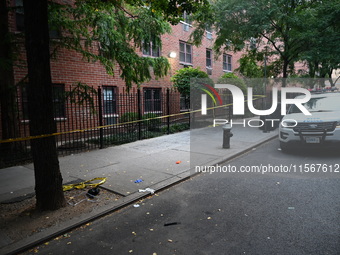 Crime scene tape is at the scene. A man is shot in the back multiple times in Manhattan, New York, United States, on September 12, 2024. At...