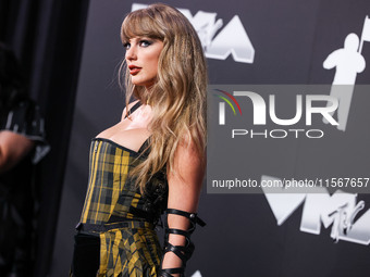 Taylor Swift wearing Dior arrives at the 2024 MTV Video Music Awards held at UBS Arena on September 11, 2024 in Elmont, New York, United Sta...