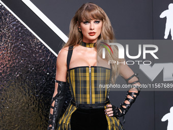 Taylor Swift wearing Dior arrives at the 2024 MTV Video Music Awards held at UBS Arena on September 11, 2024 in Elmont, New York, United Sta...