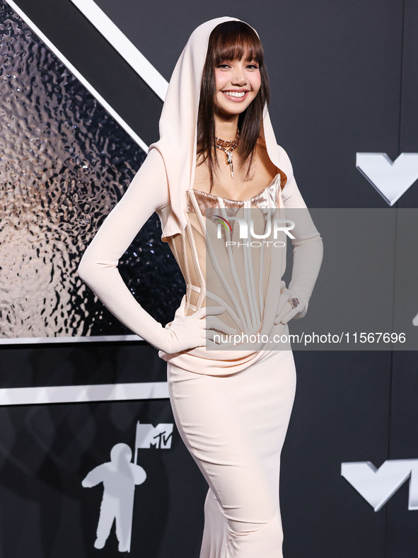 Lisa, Lalisa Manobal, Blackpink wearing Mugler arrives at the 2024 MTV Video Music Awards held at UBS Arena on September 11, 2024 in Elmont,...