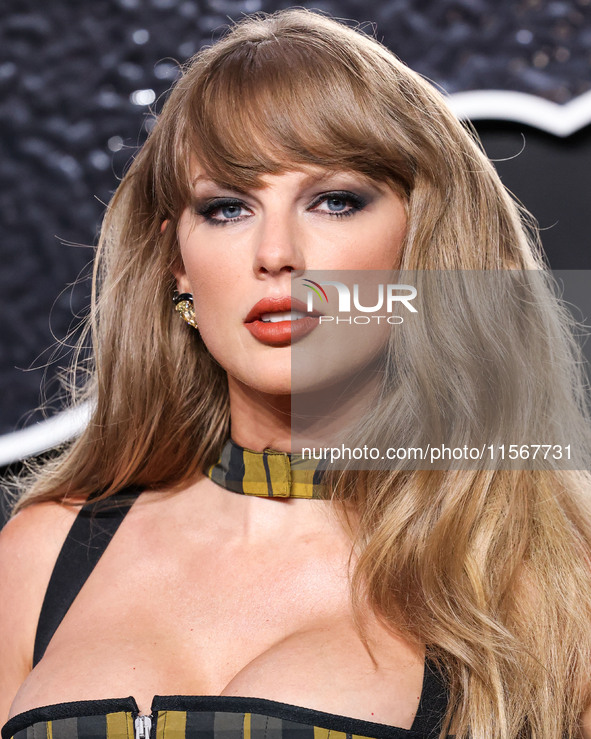 Taylor Swift wearing Dior arrives at the 2024 MTV Video Music Awards held at UBS Arena on September 11, 2024 in Elmont, New York, United Sta...