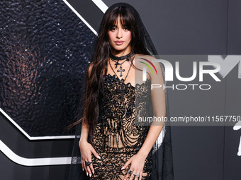 Camila Cabello wearing a Tony Ward look with Loree Rodkin jewelry arrives at the 2024 MTV Video Music Awards held at UBS Arena on September...