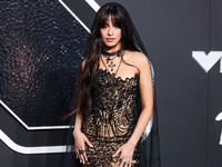 Camila Cabello wearing a Tony Ward look with Loree Rodkin jewelry arrives at the 2024 MTV Video Music Awards held at UBS Arena on September...