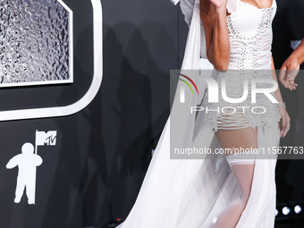 Anitta wearing a Dolce and Gabbana look with Suzanne Kalan jewelry arrives at the 2024 MTV Video Music Awards held at UBS Arena on September...