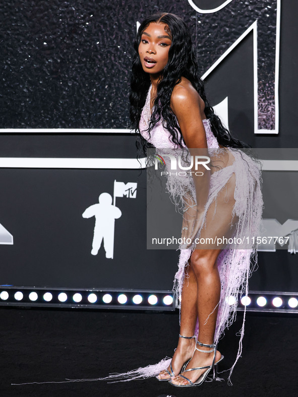 Lola Brooke arrives at the 2024 MTV Video Music Awards held at UBS Arena on September 11, 2024 in Elmont, New York, United States. 