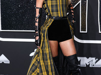 Taylor Swift wearing Dior arrives at the 2024 MTV Video Music Awards held at UBS Arena on September 11, 2024 in Elmont, New York, United Sta...