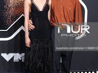 Margaret Qualley and Jack Antonoff arrive at the 2024 MTV Video Music Awards held at UBS Arena on September 11, 2024 in Elmont, New York, Un...